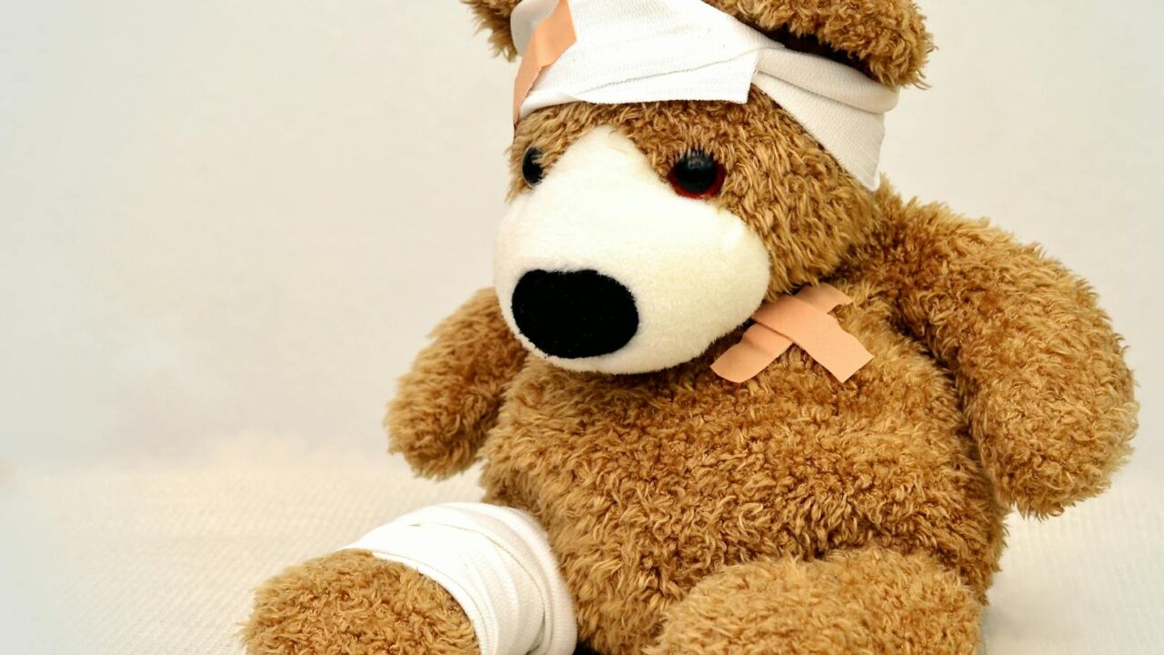 brown and white bear plush toy